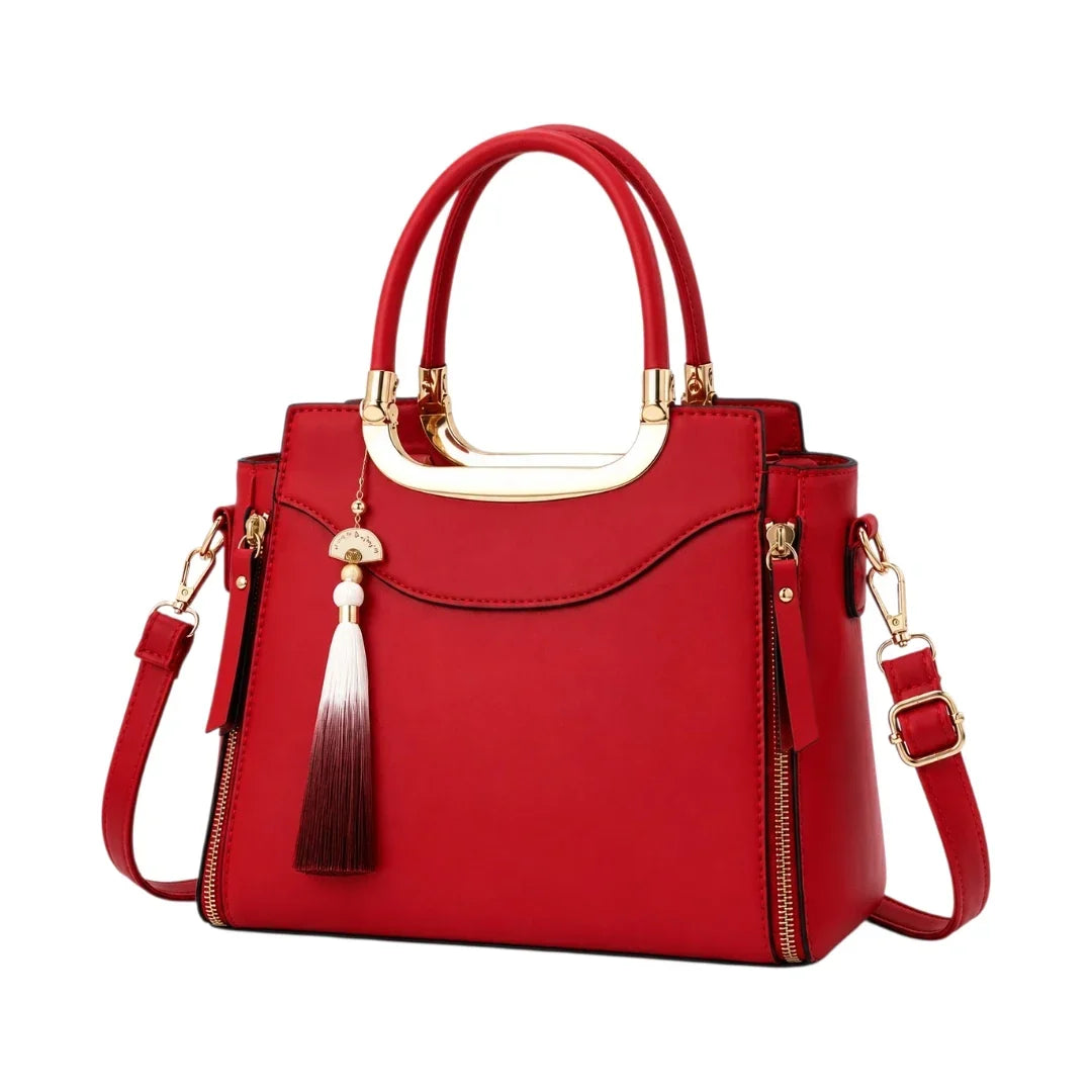 General Birchmark Ruby Red Structured Shoulder Bag, front view with tassel charm